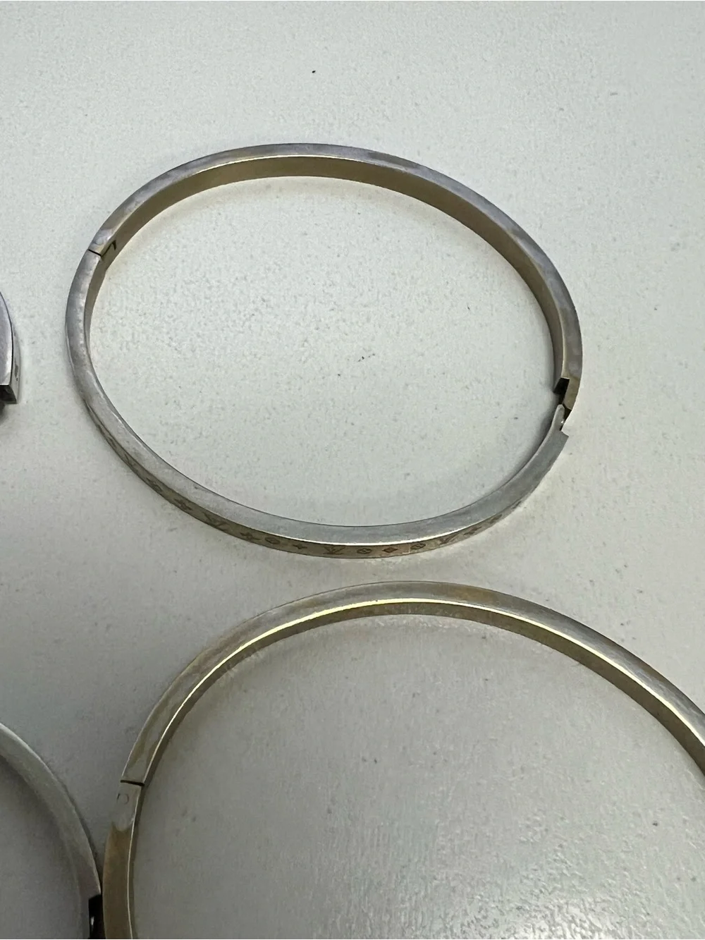 Chanel, LV, Gucci Stackable Silver and Gold Logo Bangle Set - Picture 12 of 16